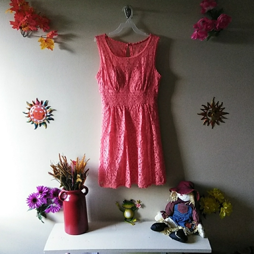 Cute midi dress in a bold coral shade.